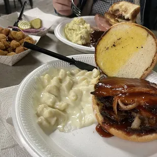 Brisket, fried okra , potato salad and Mac and cheese