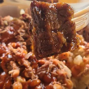 a fork lifting up a bite of jambob