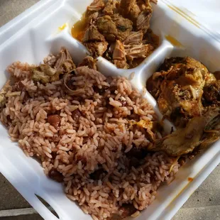 happy jerk chicken and pork with red beans &amp; rice