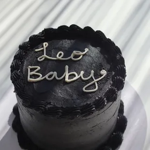 a cake with the word lee baby written on it