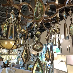 When not working as a California Modern Mission style chandelier, you can pull two of these off and use as earrings...