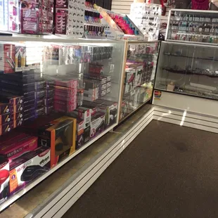 Blow dryer, hair clippers, flat iron, curl iron, body oil and scent smell.