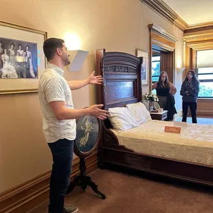 Our guide, Joseph, showing us Mrs. Hill's ' bedroom
