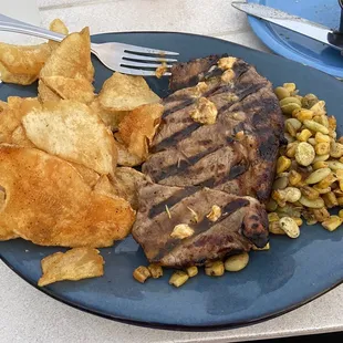 Medium well steak, when asked for medium rare, chips and succotash