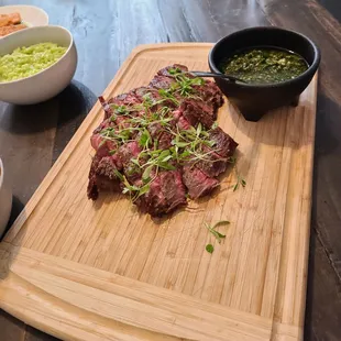 Medium Seared steak with chimichuri sauce.