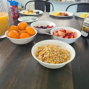 Breakfast spread and chef in the kitchen.