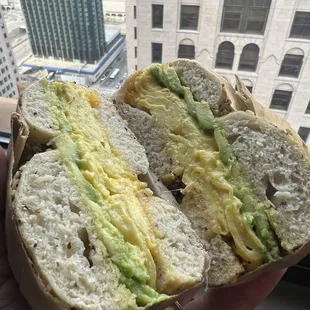 Egg avocado and cheese on an everything bagel