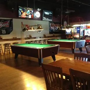 BIG back room with pool tables.