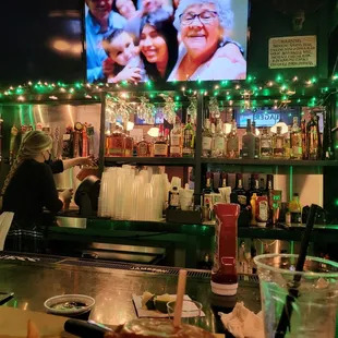 a bar with a large screen