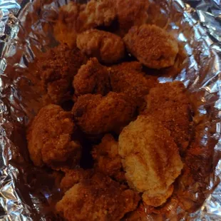 a bowl of fried chicken nuggies