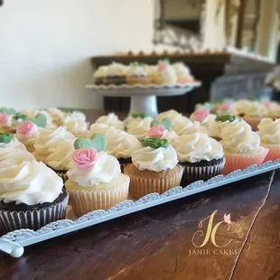 a tray of cupcakes