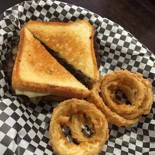 Patty melt with homemade onion rings.