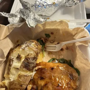 Glazed bourbon chicken, salad and baked potato.