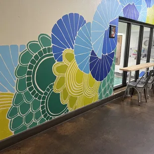 Love the bright colors throughout their hallway