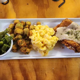 That&apos;s green beans, fried okra, mac &amp; cheese, and chicken fried chicken