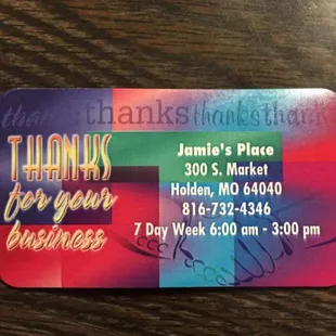 a business card on a table