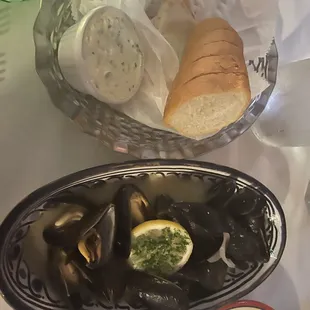 Clams steamed with garlic, white wine reduction and fresh herbs.