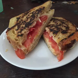 Grilled cheese with provolone and tomato inside the famous sourdough my absolute favorite !!!!!!!