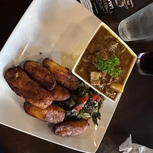 Goat curry, collard greens and sweet plantains