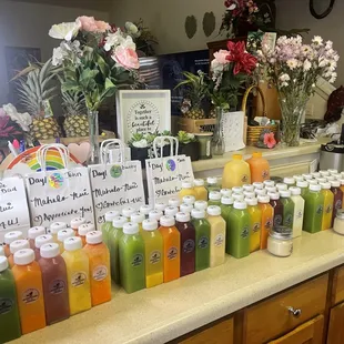 a variety of juices on a counter