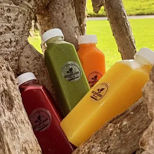 a variety of juices in a basket