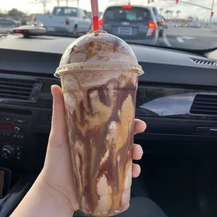 Large snickers frappacino with almond milk and chocolate whipped cream!