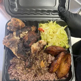 Highly requested combo &quot;jerk chicken, rice and peas, ripe fried plantains and steamed cabbage&quot;.