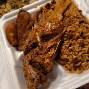 Red snapper, peas and rice and plantain close-up.