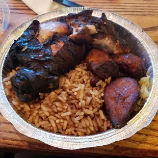 Jerk chicken with rice and beans plus some plantains, all part of their 12-2PM lunch special. 8.99! Great deal, very pure and filling food.