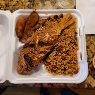 Red snapper, peas and rice and plantain.