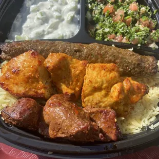 Combo plate with cucumber yogurt and tabouli