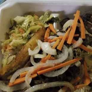 Escovitch Parrot fish, cabbage, fried plantains with rice and peas.