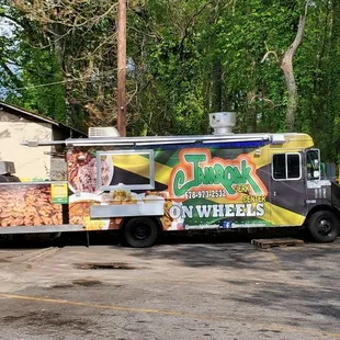 a food truck parked in a parking lot