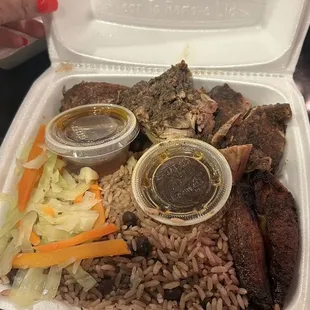 Jerk chicken with rice and peas