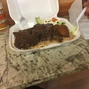 Ox tails &amp; rice and peas