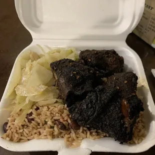 Jerk chicken, beans and rice, cabbage