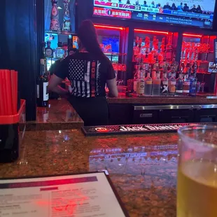 Waitress and bar area