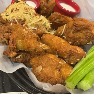 Wings with the Parmesan garlic dumped on one side