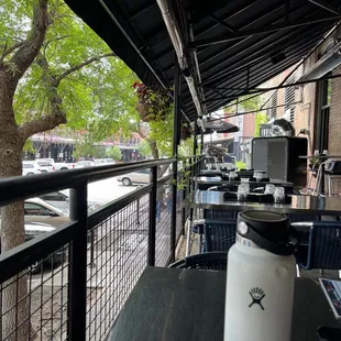 a view of a street from a restaurant