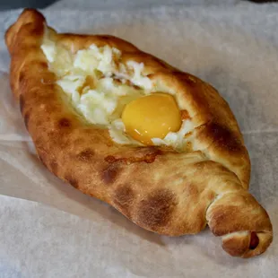 a piece of bread with an egg in it