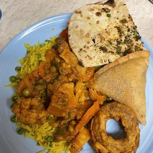 Veggie korma, garlic jalapeño roti, samosa, onion pakora.