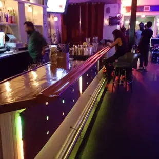 people sitting at the bar