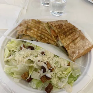 Chicken Pesto Panini with a side of Caesar salad