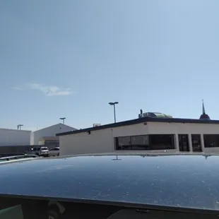 the roof of a car in a parking lot