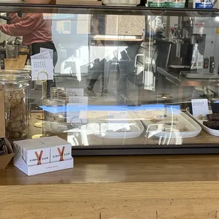 a counter with a variety of pastries