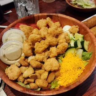 Fried Shrimp salad, egg rolls and corn and crab bisc