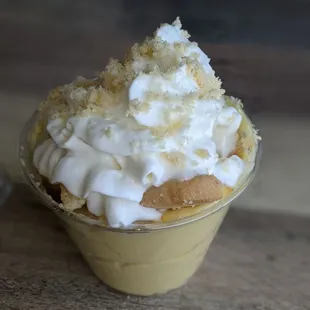 a dessert in a plastic cup