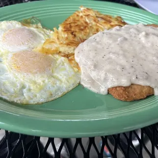 Country fried steak with eggs over medium. So so good!