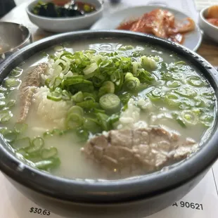 Beef soup with sliced meat and clear noodles.