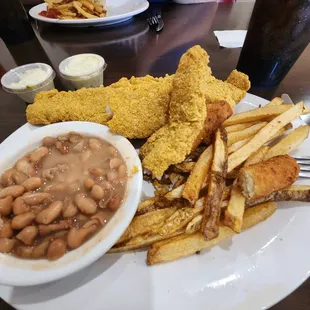 Catfish, fries, hush puppies, and pinto beans